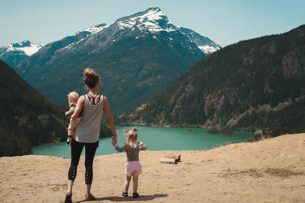 Mother and two children at a mountain view