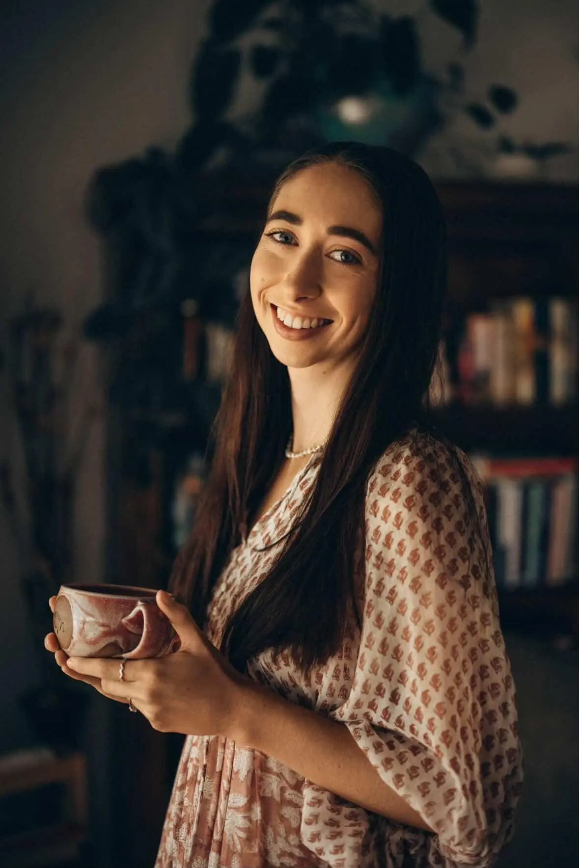 Ellen of More that Matters smiling with a cuppa